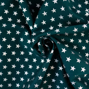 Baumwolle bedruckt - grün mit silbernen Sternen